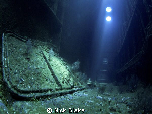 Interior of the wreck.
Light penetrates through the hull... by Nick Blake 